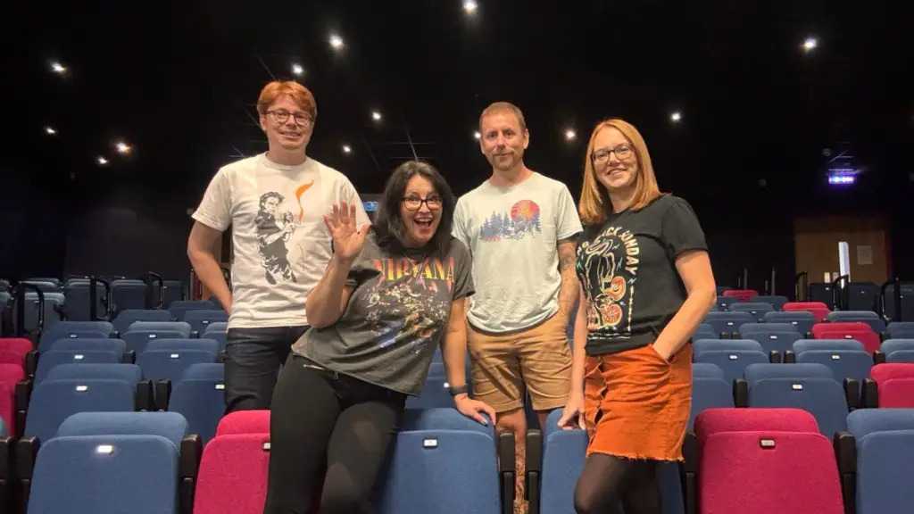 Staff in band T-shirts